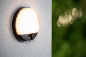 HUPS kinkiet elewacyjny okrągły czarny IP54 LED 10W 3000K z czujnikiem ruchu LUCIDE 22863/10/30